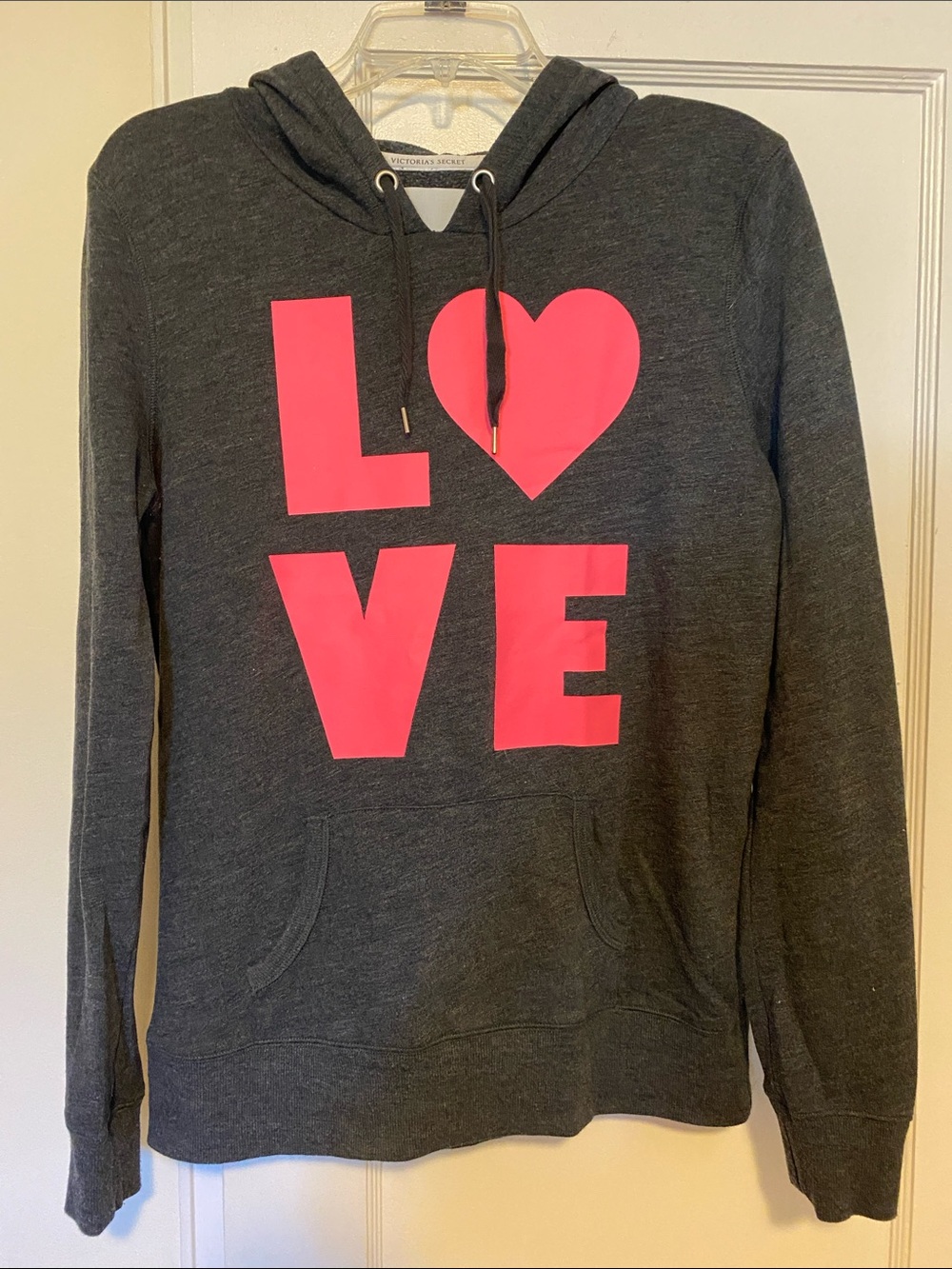 Victoria’s Secret pullover hoodie with pink LOVE graphic size medium